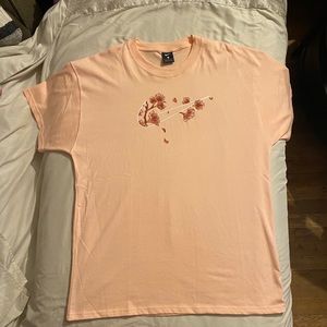 Men’s Nike cherry blossom T. (Non-smoking home)